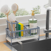 Cisily sponge holder with rotatable spout directs water into the sink, reducing countertop mess.