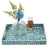 CLAYNIX serving tray with blue floral mosaic enhances tea service and decor.