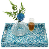 CLAYNIX serving tray with floral inlay enhances centerpiece appeal.