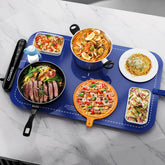 Coanto warming mat in action on buffet setup delivering even heat across a large surface.