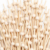 CockStixs bamboo cocktail picks highlight 4-7 inch length for elegant drinks and presentations.