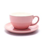Coffeezone latte art cup in glossy pink for precise latte art and heat retention.