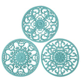Colinda trivet turquoise design A with decorative heat-safe pad for hot dishes.