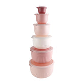 COOK WITH COLOR prep bowls with lids nest for compact storage and easy access.