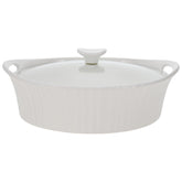 CorningWare French White oval casserole with glass lid for easy monitoring while cooking.