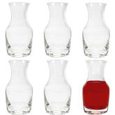 Cornucopia Brands mini wine carafes set on dining table for shared tastings