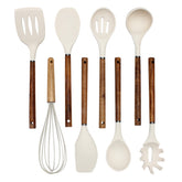 Country Kitchen ladle with rounded wood handle for smooth serving on nonstick cookware.