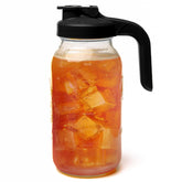 County Line Kitchen glass mason jar pitcher with lid, wide mouth for easy filling and smooth pouring.