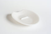 Crack'em egg cracker edge closeup showing clean cracking line for yolk-friendly separation