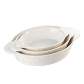 Dafuceramic casserole set in beige and white with three oval dishes for versatile oven-to-table baking.