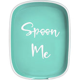 DAYYET teal ceramic spoon rest on stove top, catches drips for a cleaner cooktop.