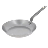 De Buyer Mineral B carbon steel frying pan searing steak for a crusty finish.