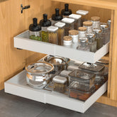 DEKAVA pull-out cabinet organizer expandable in use, offering space-saving storage in a white finish.