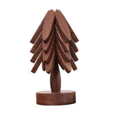 DEOLD Tree Trivet set assembled protecting countertops from hot dishes.