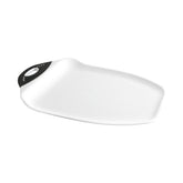 Dexas Chop & Scoop board cutting juicy fruits with a curved edge to contain juices.