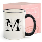DHQH monogram mug with initial M, ideal for daily coffee rituals.