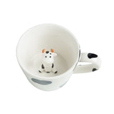 DIHOclub cow ceramic cup with hidden 3D cow inside for playful coffee moments.