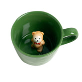 DIHOclub Bow Tie Bear mug with hidden figure peeking, ideal for coffee lovers.