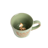 DIHOclub Giraffe mug with green glaze and 3D inside design peeking out for a playful touch