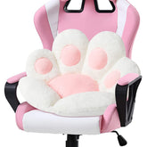 Ditucu cat paw cushion in white plush fabric for cozy chair comfort.