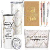 Domensi 20oz tumbler with rustic marble sign demonstrating temperature retention.