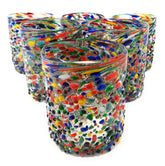 Dos Sueños hand blown glass tumbler with confetti rock design for festive entertaining.