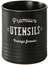 Dowan matte black utensil holder on kitchen counter adds farmhouse charm.
