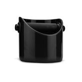 Dreamfarm Grindenstèin sturdy black espresso knock box on counter for mess-free coffee rituals.