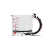 Dreamfarm Upcup shows 250 ml measurement with an easy-grip surface for sticky ingredients