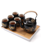 DUJUST Japanese Tea Set teapot with countryside motif enhances tea moments.