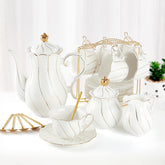 DUJUST teapot with golden trim, delivering an elegant serving experience.