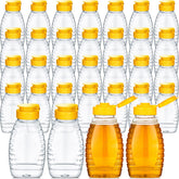 Eccliy honey jar with clear body and yellow cap for easy honey dispensing at home.
