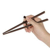 Edison Friends training chopsticks for adults showing the correct grip and control