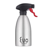 Evo Oil Sprayer with stainless steel body dispenses olive oil evenly for cooking.