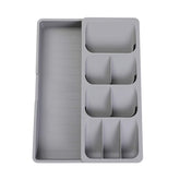 Faridabio silverware organizer tray, neatly organizing a kitchen drawer.