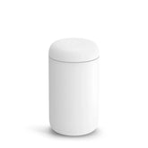 Fellow Carter wide travel mug with ceramic interior for rich flavor on the go.