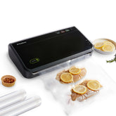 FoodSaver vacuum sealer machine with automatic bag detection sealing food effortlessly.
