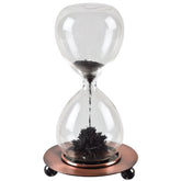 Westminster Magnetic Sand Timer on copper base creating mesmerizing desk sculpture.