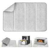 FYY heat-resistant mat protecting a wooden table under a hot pan