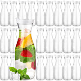 Gejoy water carafe 32oz clear with lids for serving beverages at home or parties.