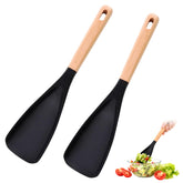 Generic Cedar and Ash Spoonula stirring with comfortable grip for easy cooking