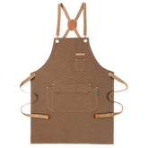 Genixart cross-back apron with pockets for easy tool access.