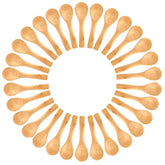 Gleihow mini wooden spoons laid flat beside a scrub jar for precise scooping