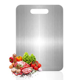 Gnodry Titanium Cutting Board on the kitchen counter showing the large dual-sided surface for fruits and vegetables.