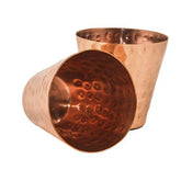 GoCraft copper shot glasses on wood display with elegant sheen