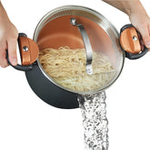 Gotham Steel stock pot with built-in strainer lid for easy draining.