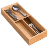 guiogc bamboo silverware drawer organizer in a tidy kitchen drawer holds spoons, forks, and knives
