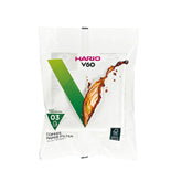 Hario V60 size 03 white paper filters for a clean cup.