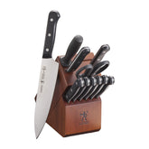 HENCKELS Solution 12pc knife set in a walnut block for organized storage and quick access.