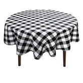 Hiasan checkered round tablecloth on black-and-white plaid surface for stylish dining.